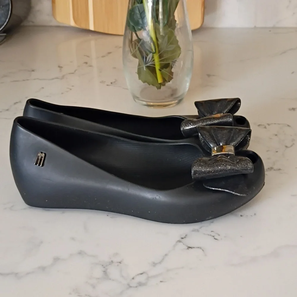 Melissa Black Flats with Metallic Bow